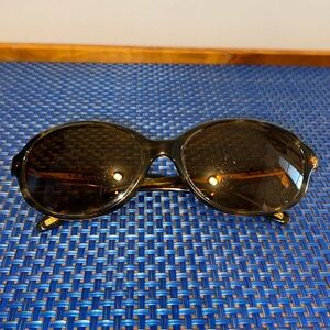Ralph Lauren sunglasses used condition, scratches- but wearable.